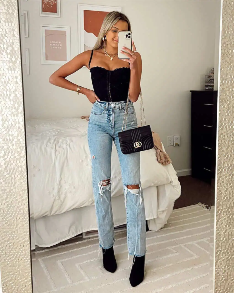 2. Chic Bodysuit And Distressed Denim Combo