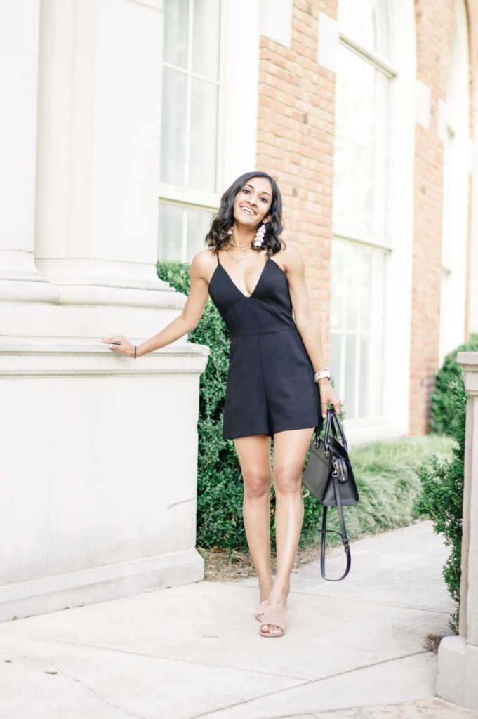 7. Sultry Black Romper With Plunging Neckline