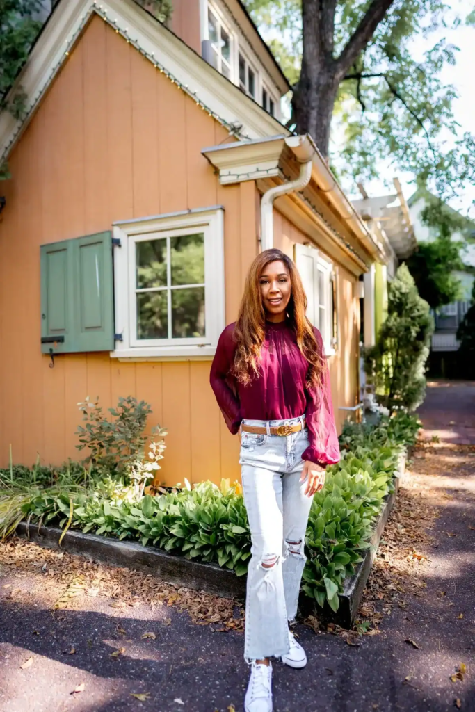 9. Burgundy Blouse And Distressed Denim
