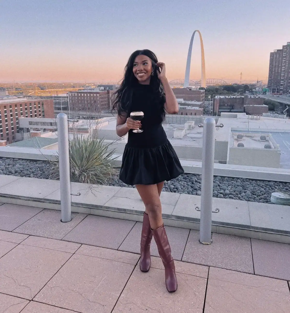 13. Chic LBD With Knee-High Boots