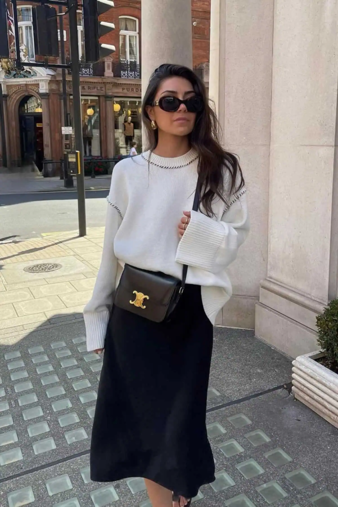 11. Monochrome Sophistication With Designer Accents