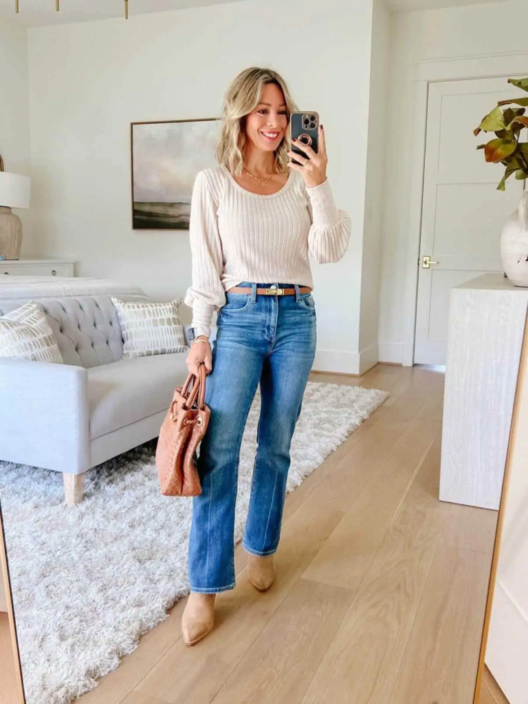 13. Cozy Cream Sweater And Bootcut Jeans