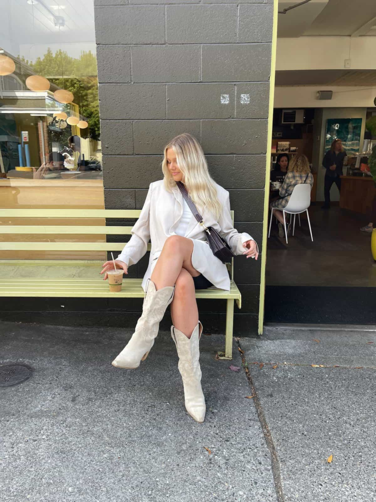 13. Chic Cream Coat And Boots