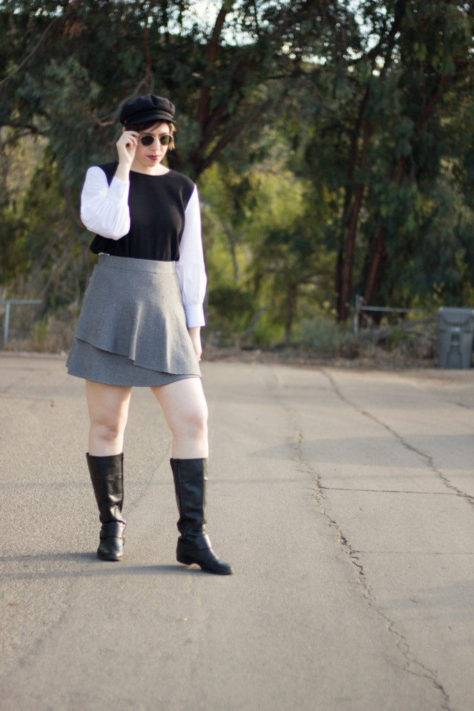 9. Monochrome Chic With Knee-High Boots