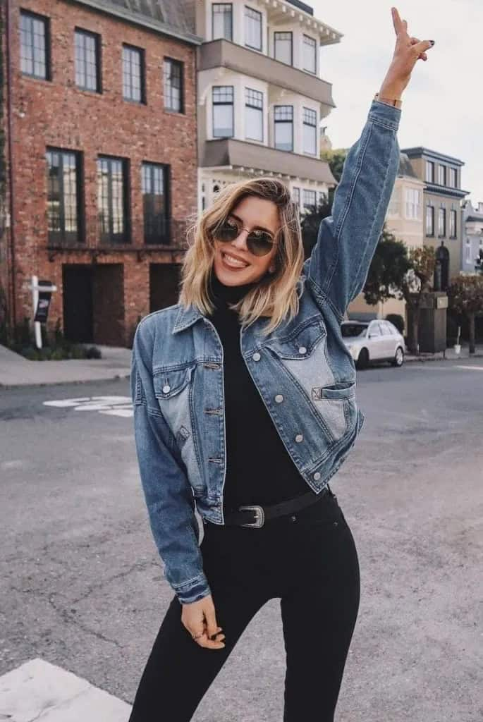 12. Classic Denim Over All-Black Ensemble