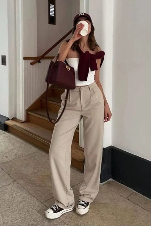 Trousers, Strapless Top, Baseball Cap, and Tied Sweater