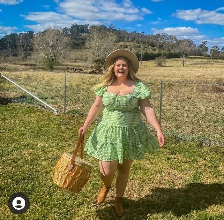 Vibrant Red Top with Abstract Print Skirt