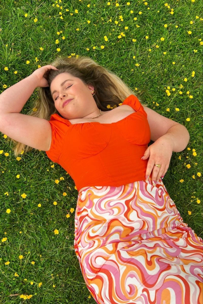 Vibrant Red Top with Abstract Print Skirt