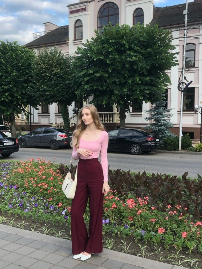 Pink Fitted Top With Burgundy Trousers