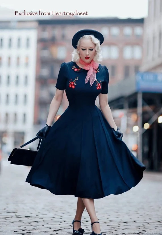 Elegant Navy Dress With Floral Accents