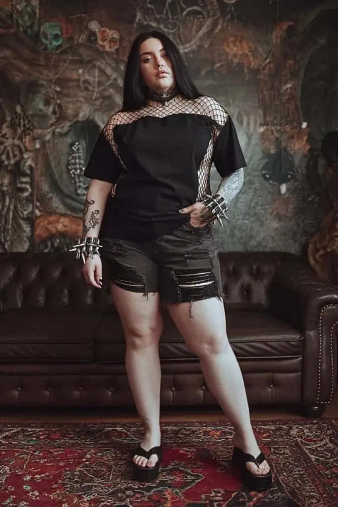 14. Edgy Mesh And Distressed Denim