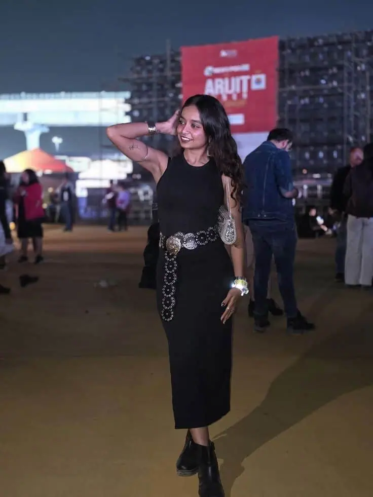 Sleek Black Midi With Statement Belt