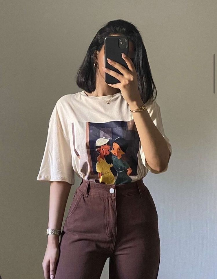 Vintage Graphic Tee with High-Waisted Pants