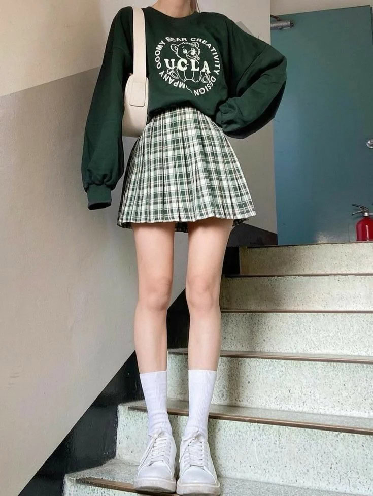 Collegiate Chic: Sweatshirt and Plaid Skirt