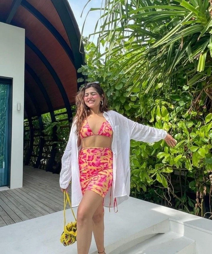 Vibrant Bikini with Flowing White Shirt